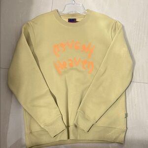 Stylish Yellow Crewneck Sweater with Orange Print